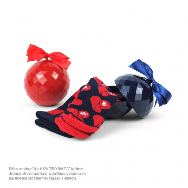 Individually designed socks in a decorative fir ball